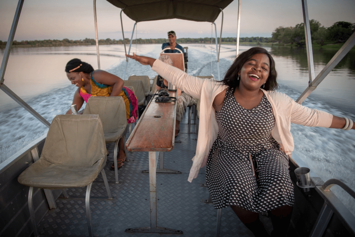 people on boat enjoying the ride
